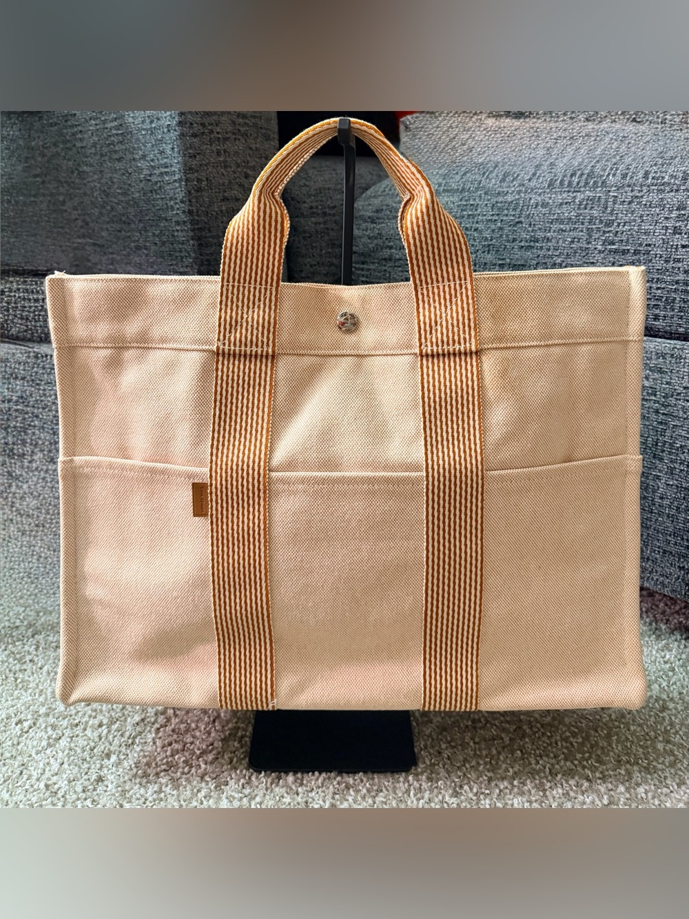 The Hermès Fourre
Tout tote MM (Canvas Orange/Beige)